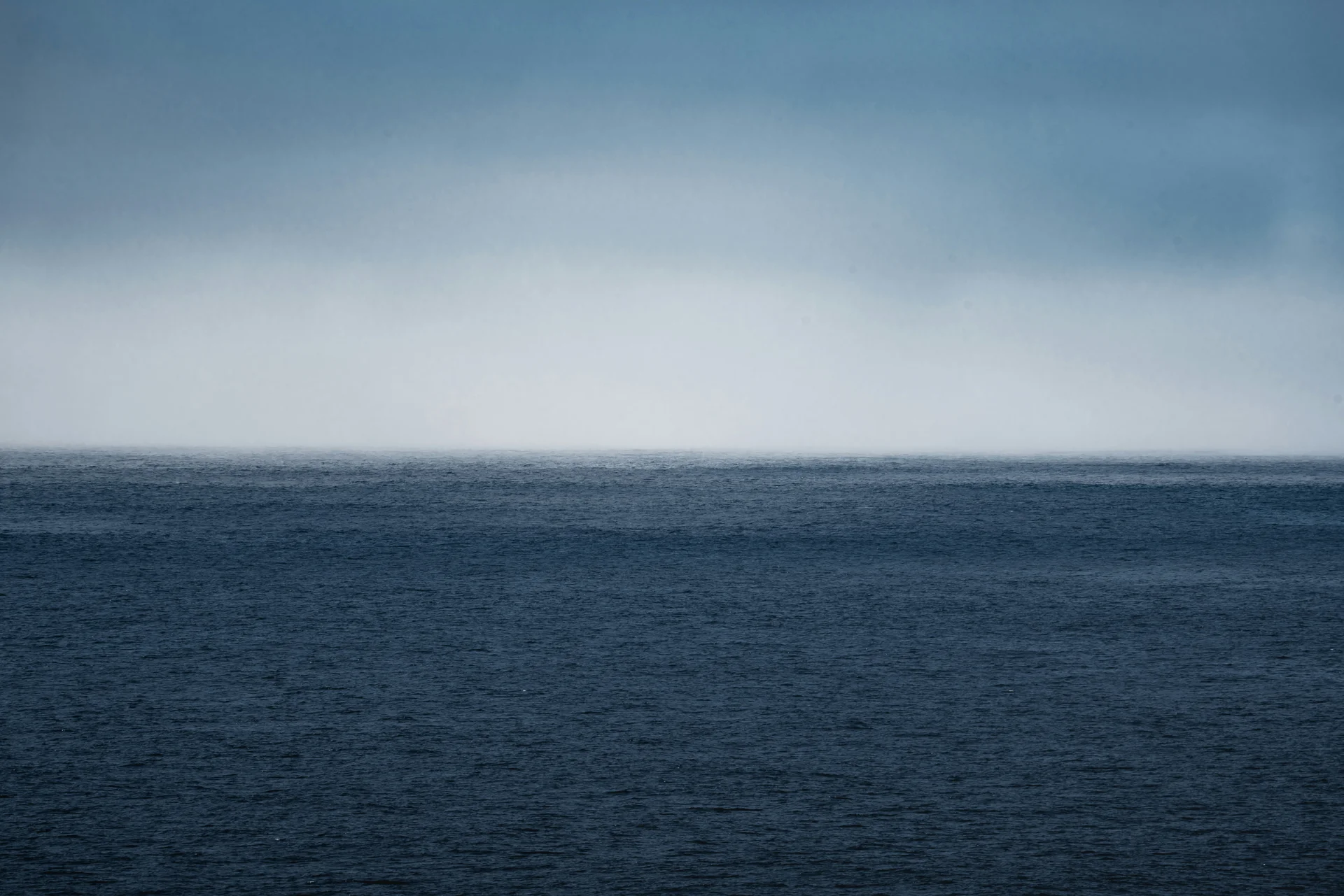 Open Atlantic water beneath a misty horizon